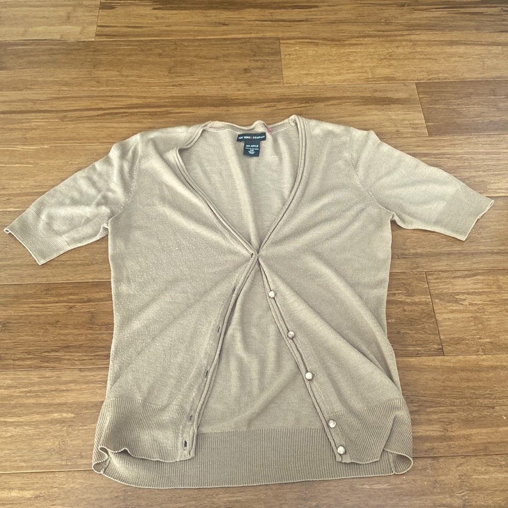 Light cream brown short sleeve sweater size XS but would fit a Small